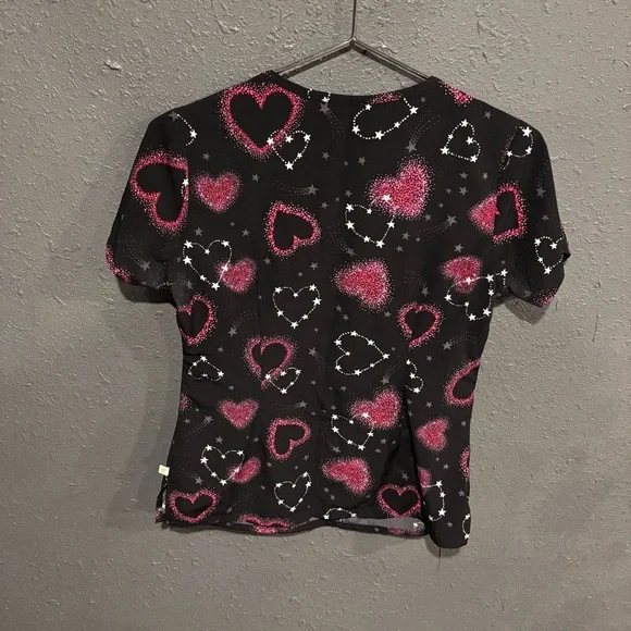 Women’s Healings Hands Black and Pink Heart Patterned Scrub Top - Picture 4 of 4